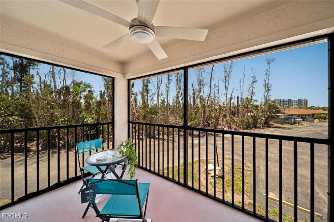 16881 Davis Road, Unit 721 Fort Myers, FL 33908 - Photo 19 of 23 a view of a chairs in balcony