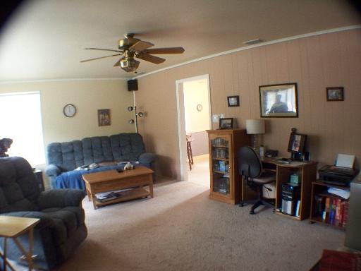 2333 175th Street Homewood, IL 60430 - Photo 3 of 11 a living room with furniture and a dining table with bookshelf