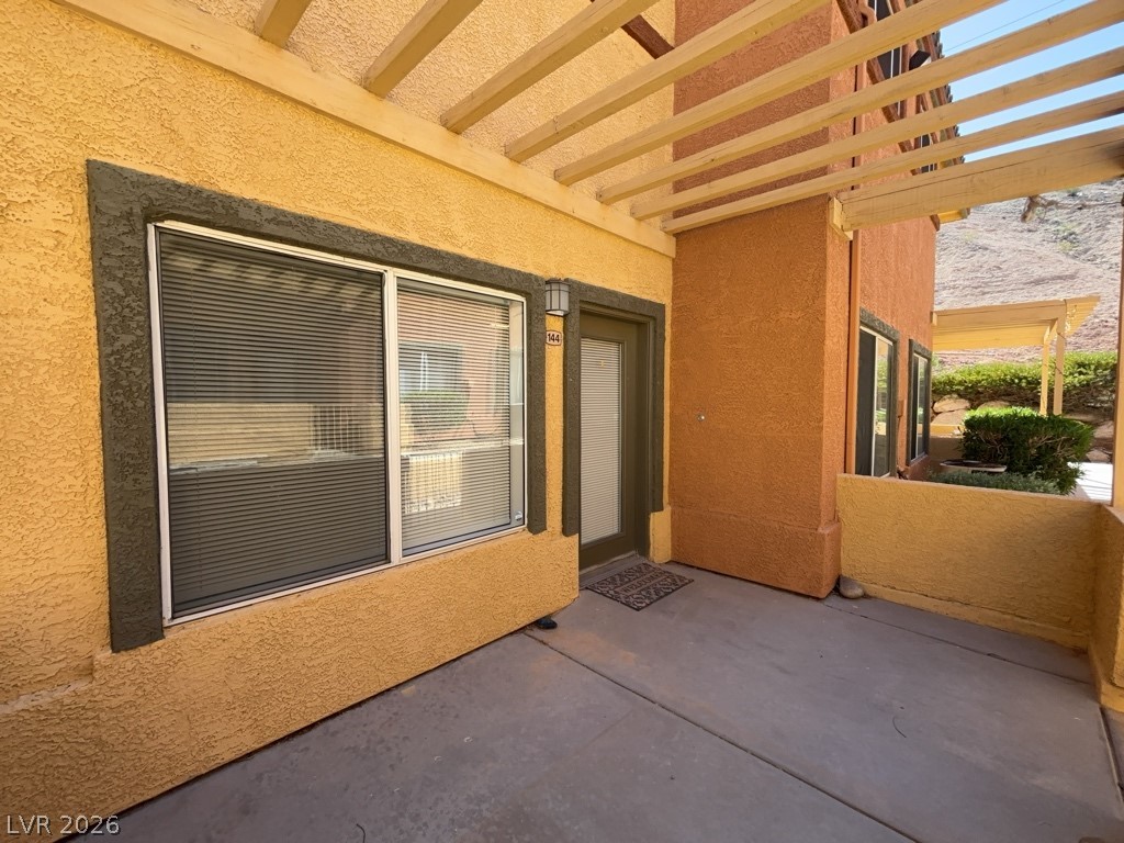 4915 East Russell Road, Unit 144 Las Vegas, NV 89120 - Photo 1 of 14 View of patio featuring a pergola