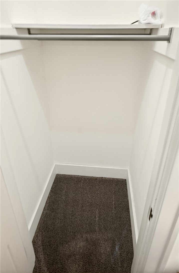 107 Riverside Drive Piqua, OH 45356 - Photo 27 of 69 Functional closet space with hanging rod and ample storage.