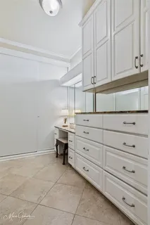 a view of cabinets and window