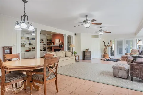 a view of a livingroom with furniture and chandelier