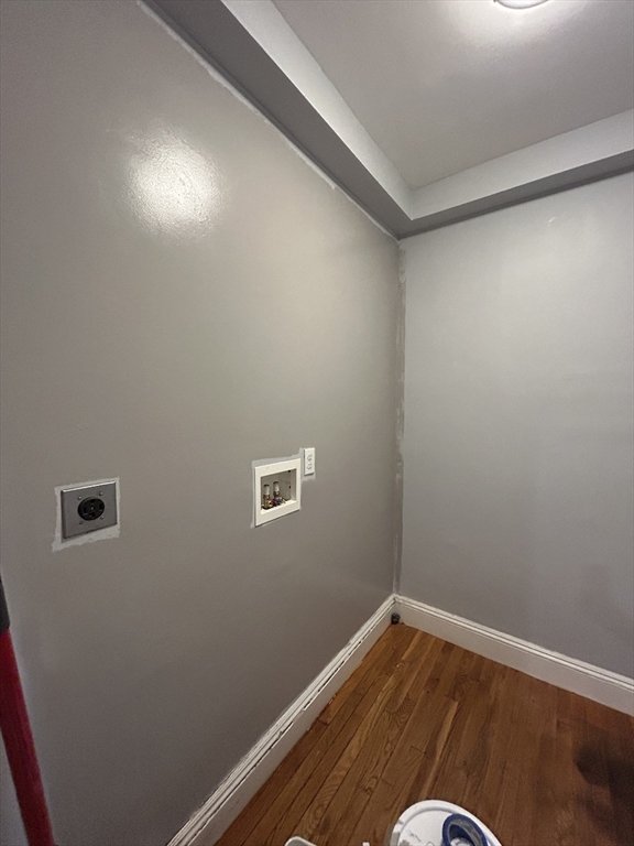 36 Hosmer Street, Unit 2 Boston, MA 02126 - Photo 16 of 30 a view of a room with wooden floor