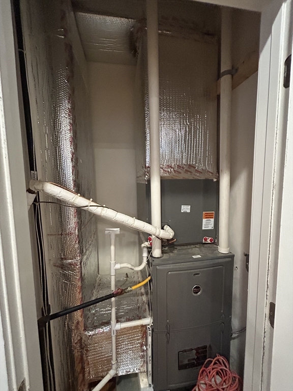 36 Hosmer Street, Unit 2 Boston, MA 02126 - Photo 22 of 30 a close view of water heater room