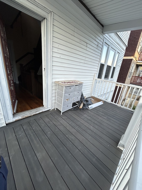 36 Hosmer Street, Unit 2 Boston, MA 02126 - Photo 25 of 30 a view of wooden floor in a balcony