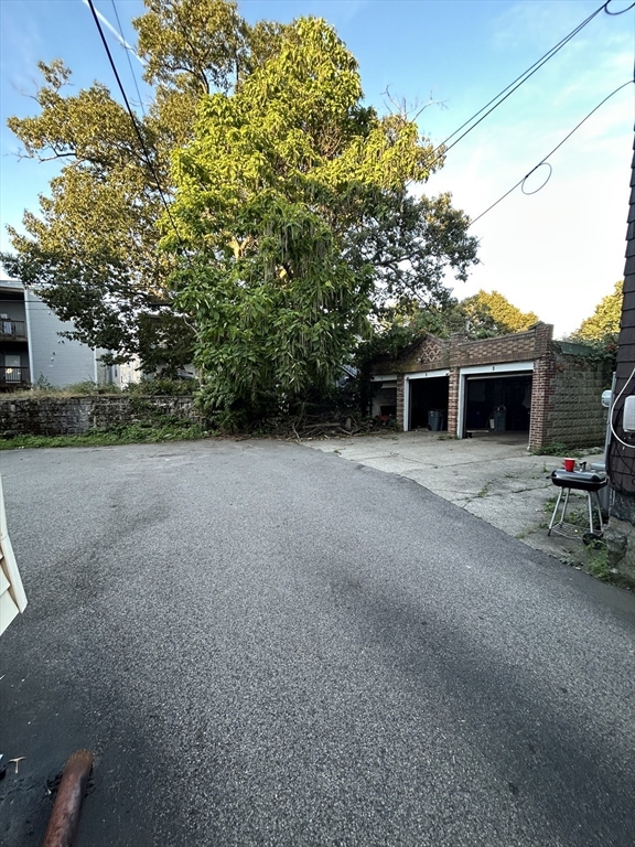 36 Hosmer Street, Unit 2 Boston, MA 02126 - Photo 30 of 30 a view of a house with a backyard