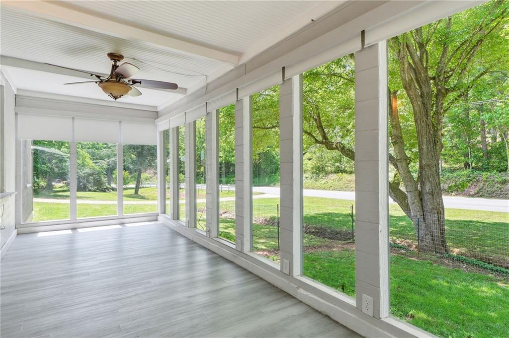 1709 Harrington Road Ball Ground, GA 30107 - Photo 7 of 46 a view of an porch with furniture and garden