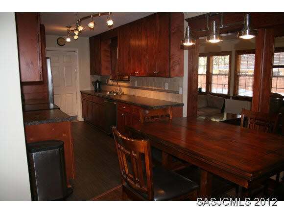 113 Linden Road St. Augustine, FL 32086 - Photo 13 of 19 a kitchen with a sink cabinets and wooden floor