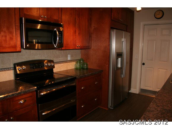 113 Linden Road St. Augustine, FL 32086 - Photo 14 of 19 a kitchen with a sink and cabinets