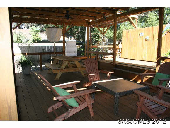 113 Linden Road St. Augustine, FL 32086 - Photo 17 of 19 a view of a room with furniture and wooden floor
