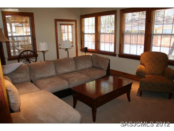 113 Linden Road St. Augustine, FL 32086 - Photo 5 of 19 a living room with furniture and a large window