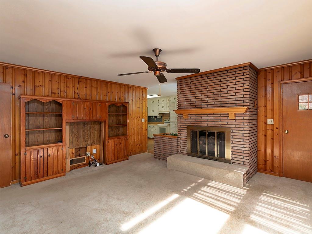 721 Woodvalley Road Southwest Mableton, GA 30126 - Photo 7 of 26 a view of a livingroom with an empty space and a fireplace