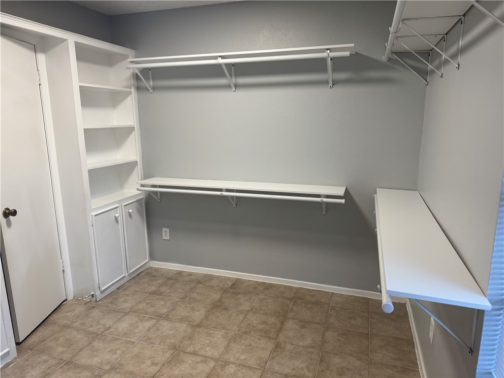 5518 Kenith Circle Corpus Christi, TX 78413 - Photo 12 of 21 a view of an empty walk in closet