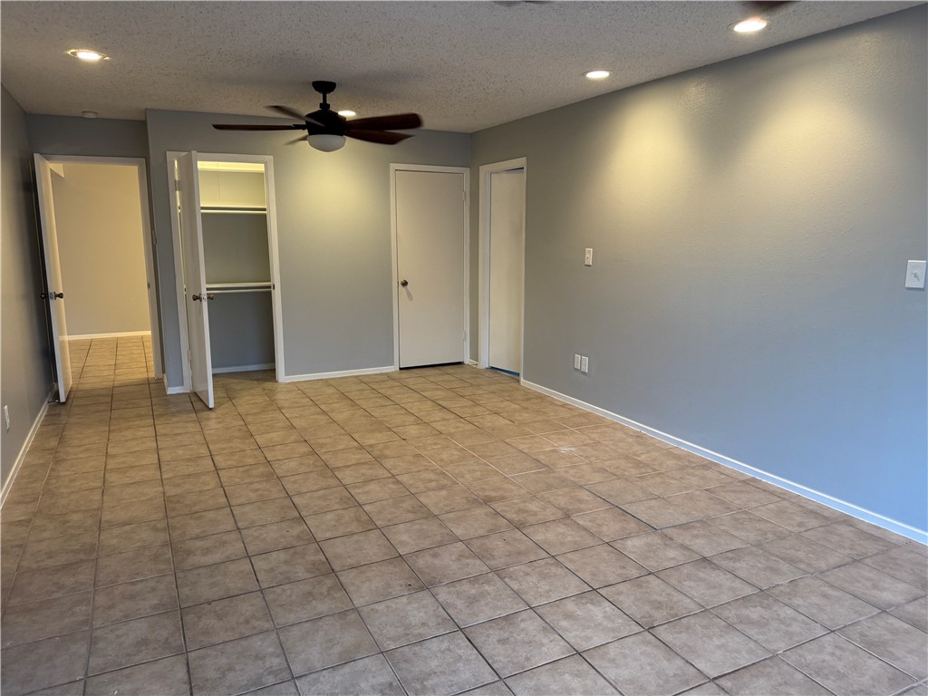 5518 Kenith Circle Corpus Christi, TX 78413 - Photo 13 of 21 an empty room with closet and wooden floor