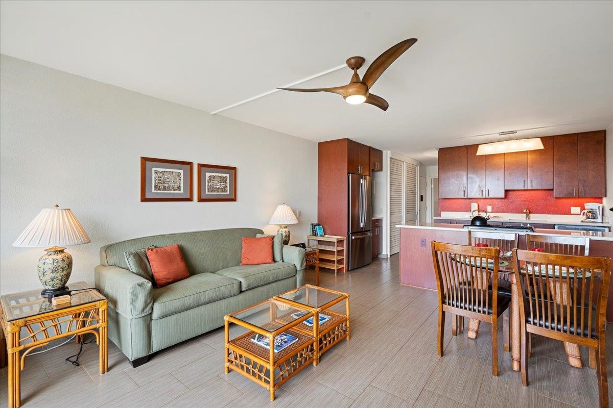 2191 South Kihei Road, Unit 2303 Kihei, HI 96753 - Photo 13 of 43 a living room with furniture and a large window