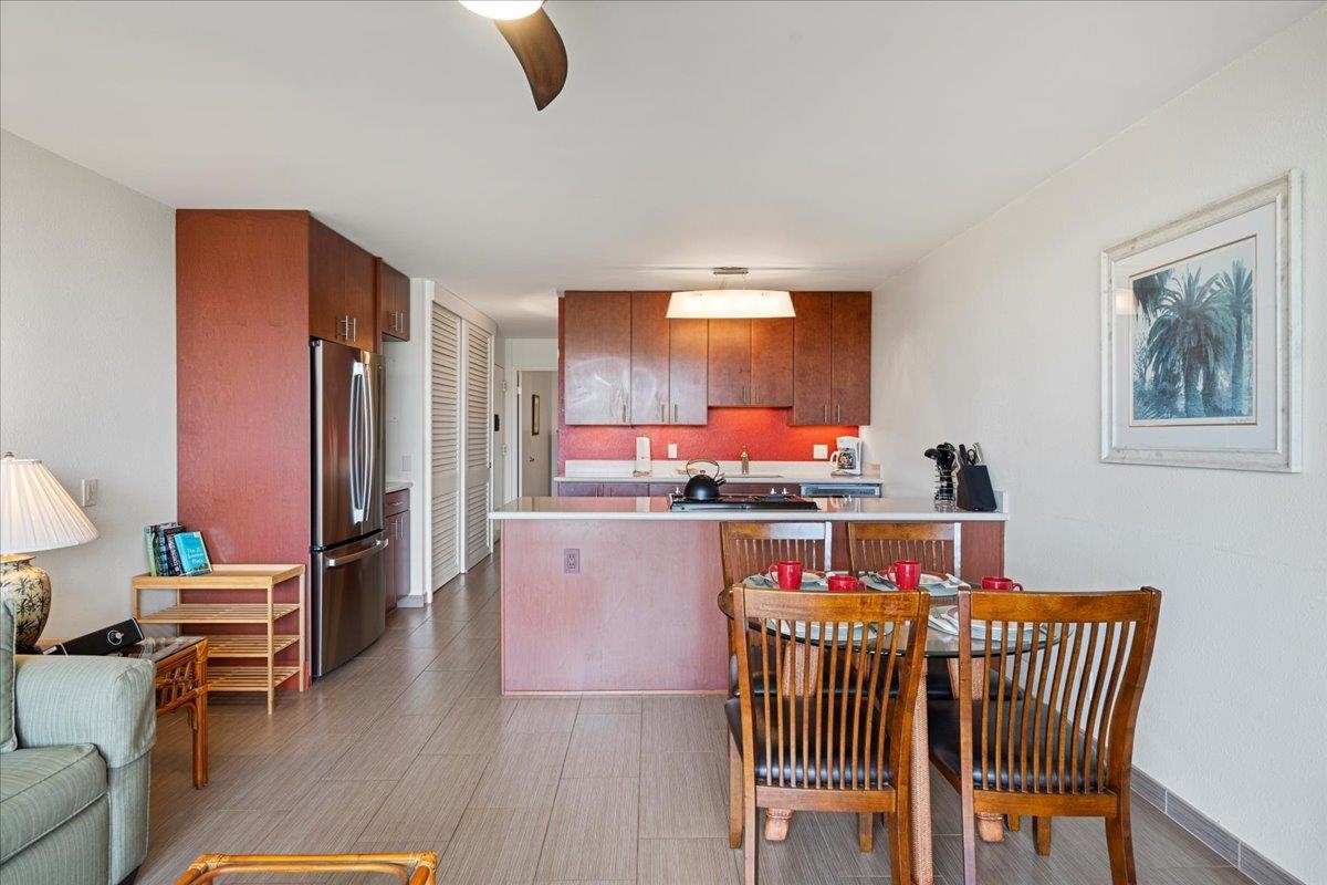 2191 South Kihei Road, Unit 2303 Kihei, HI 96753 - Photo 16 of 43 a dining room with furniture and window