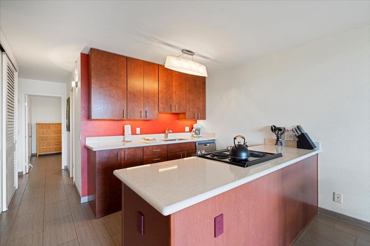 2191 South Kihei Road, Unit 2303 Kihei, HI 96753 - Photo 17 of 43 a room with furniture and wooden floor