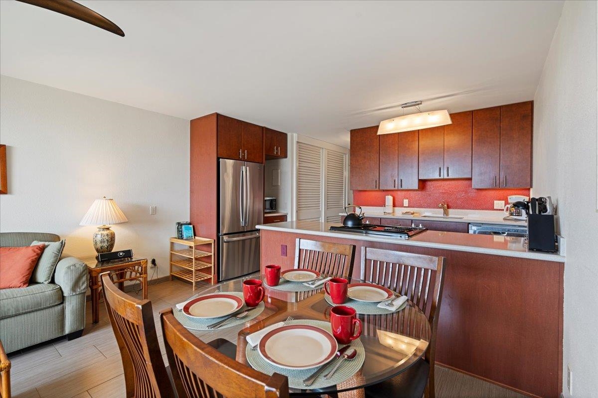 2191 South Kihei Road, Unit 2303 Kihei, HI 96753 - Photo 26 of 43 a view of a dining room with furniture