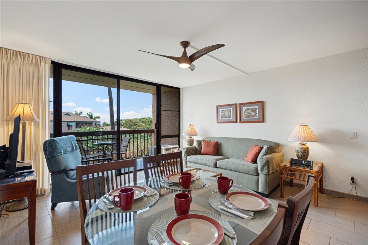 2191 South Kihei Road, Unit 2303 Kihei, HI 96753 - Photo 28 of 43 a living room with furniture and a large window