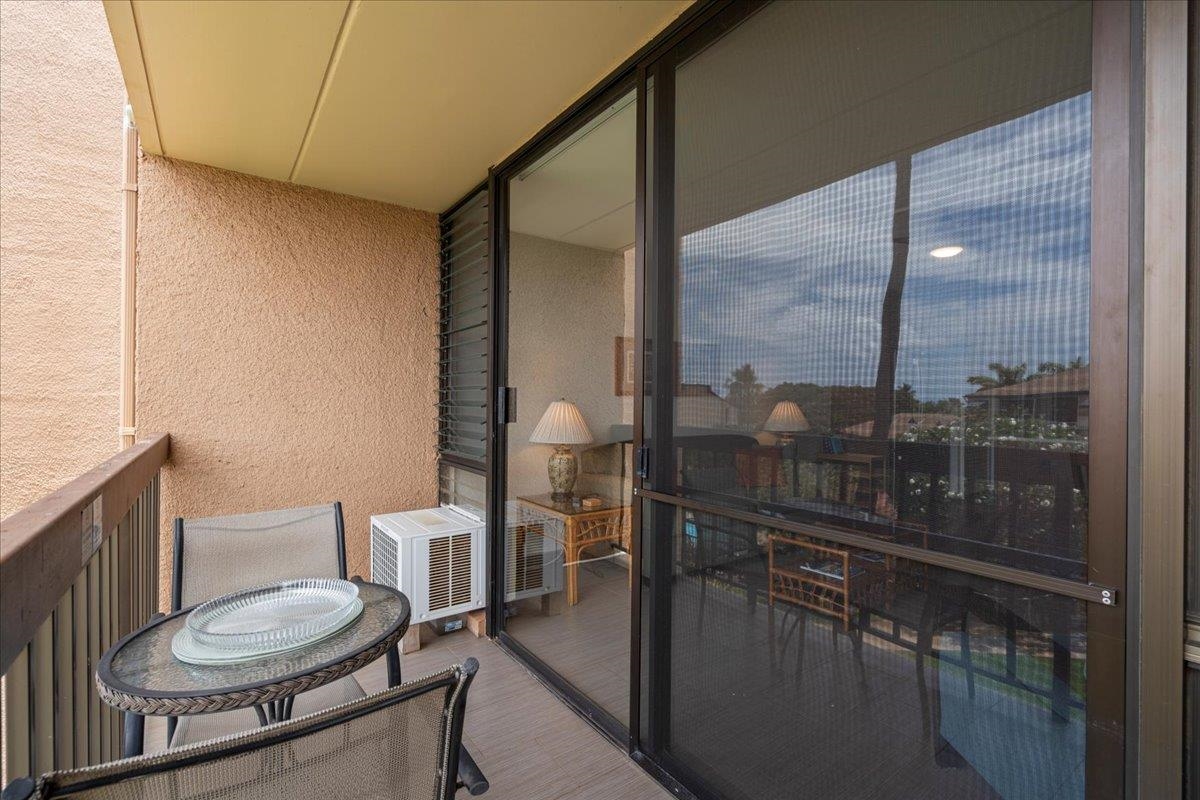 2191 South Kihei Road, Unit 2303 Kihei, HI 96753 - Photo 30 of 43 a bathroom with a toilet a sink and mirror