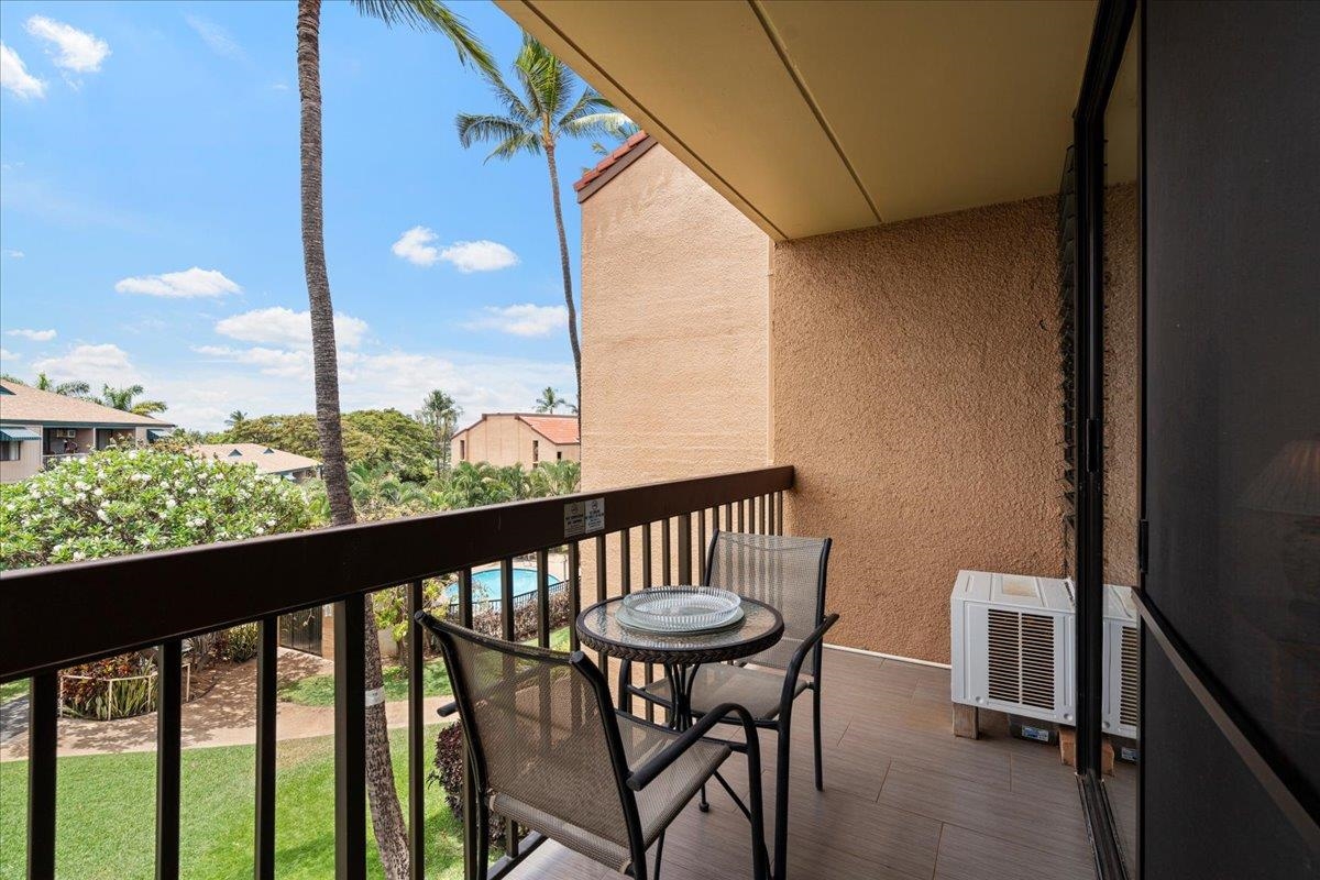 2191 South Kihei Road, Unit 2303 Kihei, HI 96753 - Photo 32 of 43 a view of a balcony with chairs
