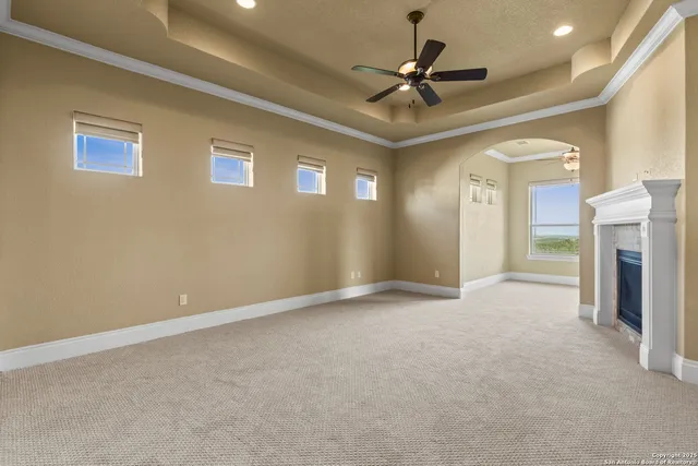 a kitchen with granite countertop a stove and a sink