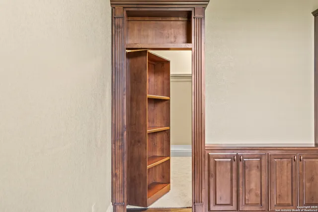 a view of a two chairs in the balcony