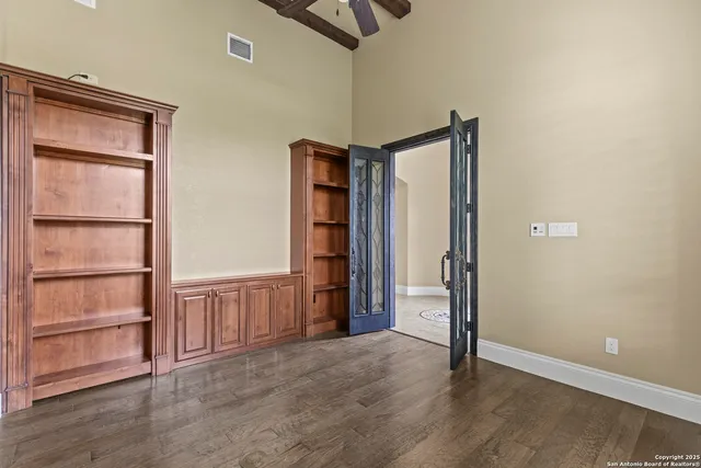 a view of a city with lush green forest