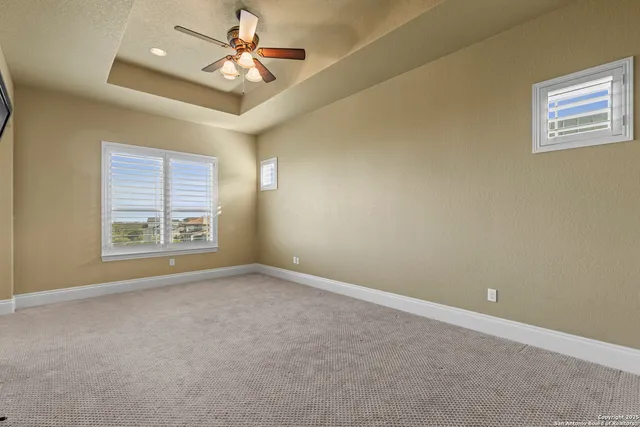 an aerial view of city and lake