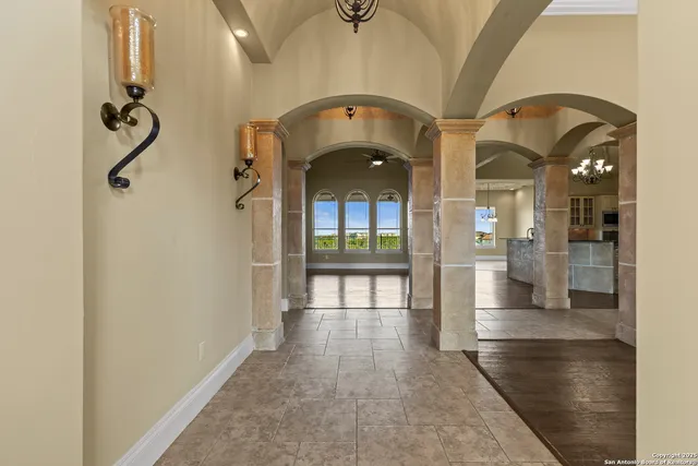 a view of an entryway with a chandelier