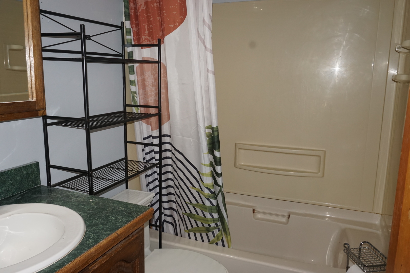 14542 Turner Avenue Midlothian, IL 60445 - Photo 11 of 20 a bathroom with a granite countertop sink and a mirror