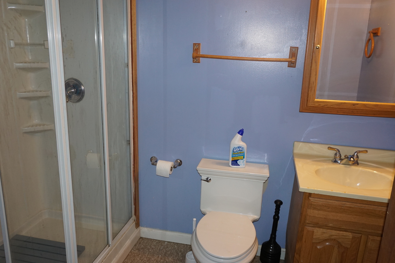 14542 Turner Avenue Midlothian, IL 60445 - Photo 16 of 20 a white toilet sitting next to a bathroom sink