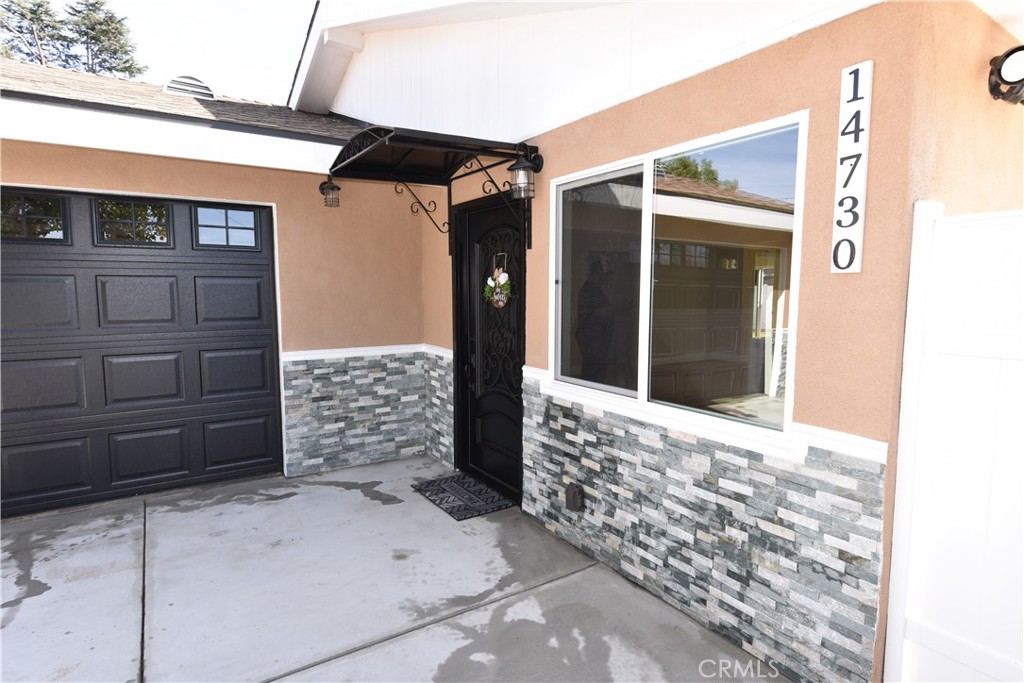 14730 Clark Street Baldwin Park, CA 91706 - Photo 5 of 5 a view of front door of house