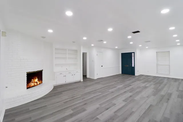 a view of storage and utility room with washer and dryer