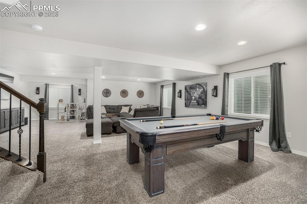 17835 Mining Way Monument, CO 80132 - Photo 36 of 49 a view of a livingroom with furniture and window