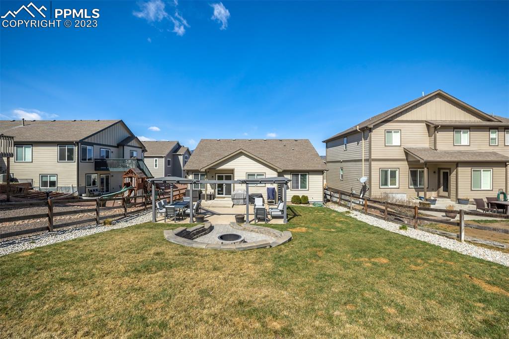 17835 Mining Way Monument, CO 80132 - Photo 46 of 49 a view of a house with swimming pool and sitting area