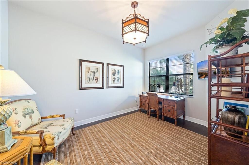 13576 Mandarin Circle Naples, FL 34109 - Photo 14 of 24 a view of a livingroom with furniture and wooden floor
