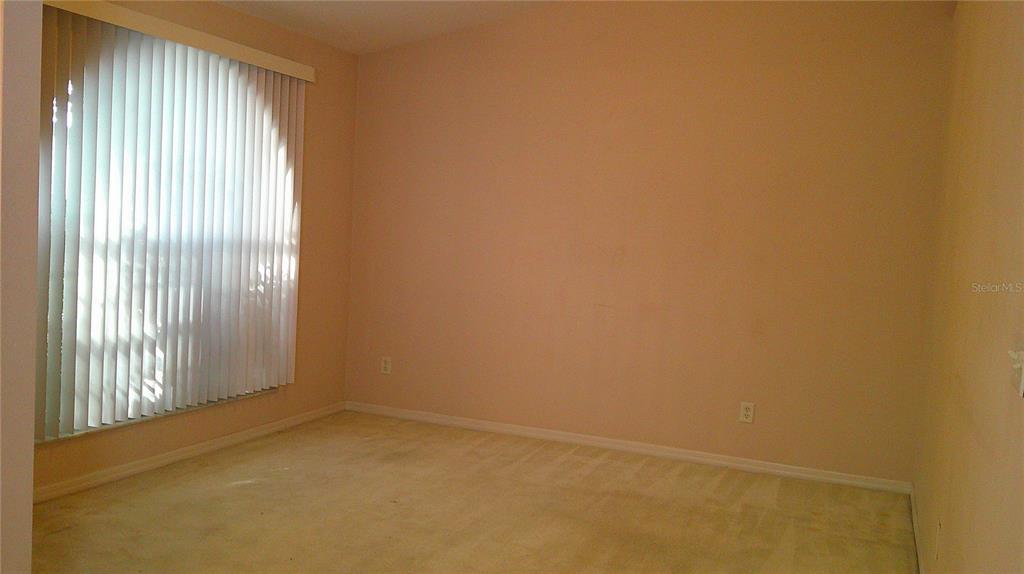 9724 Mary Robin Drive Riverview, FL 33569 - Photo 4 of 20 a view of an empty room with a window