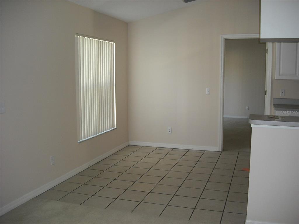 9724 Mary Robin Drive Riverview, FL 33569 - Photo 5 of 9 a view of an empty room and window