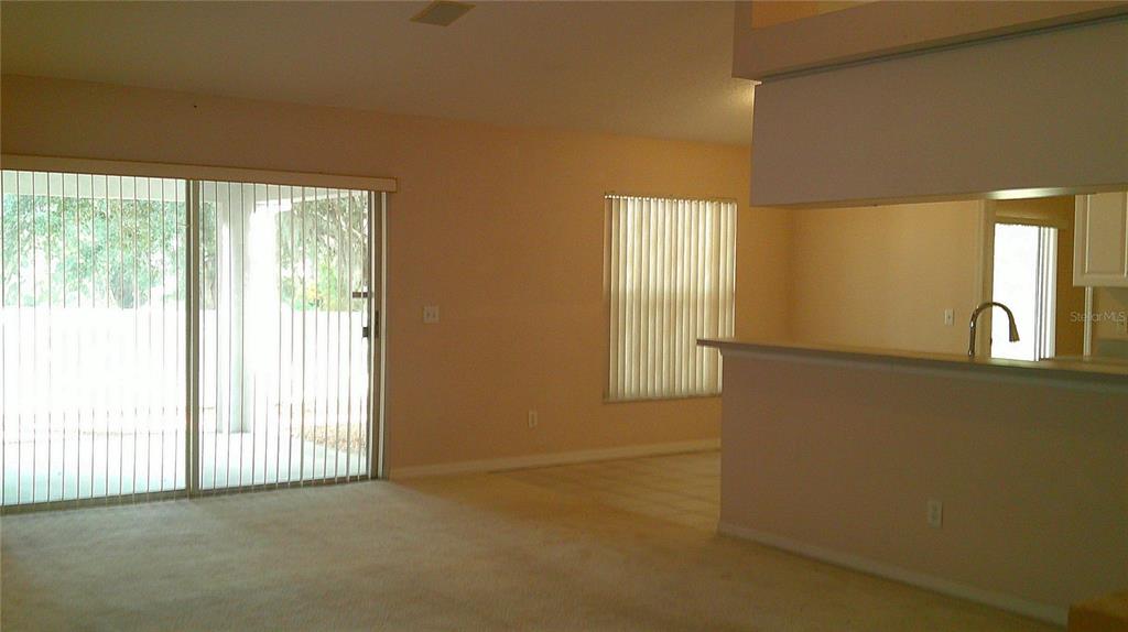 9724 Mary Robin Drive Riverview, FL 33569 - Photo 7 of 20 a view of an empty room with a window