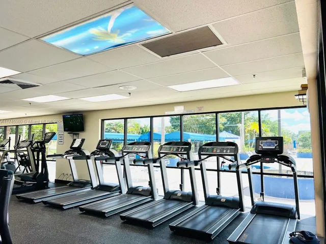 a view of a room with gym equipment