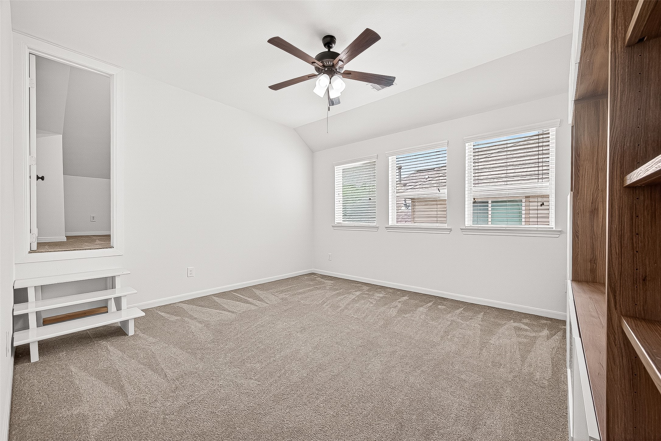 138 South Sawbridge Circle Spring, TX 77389 - Photo 25 of 37 an empty room with chandelier fan and windows