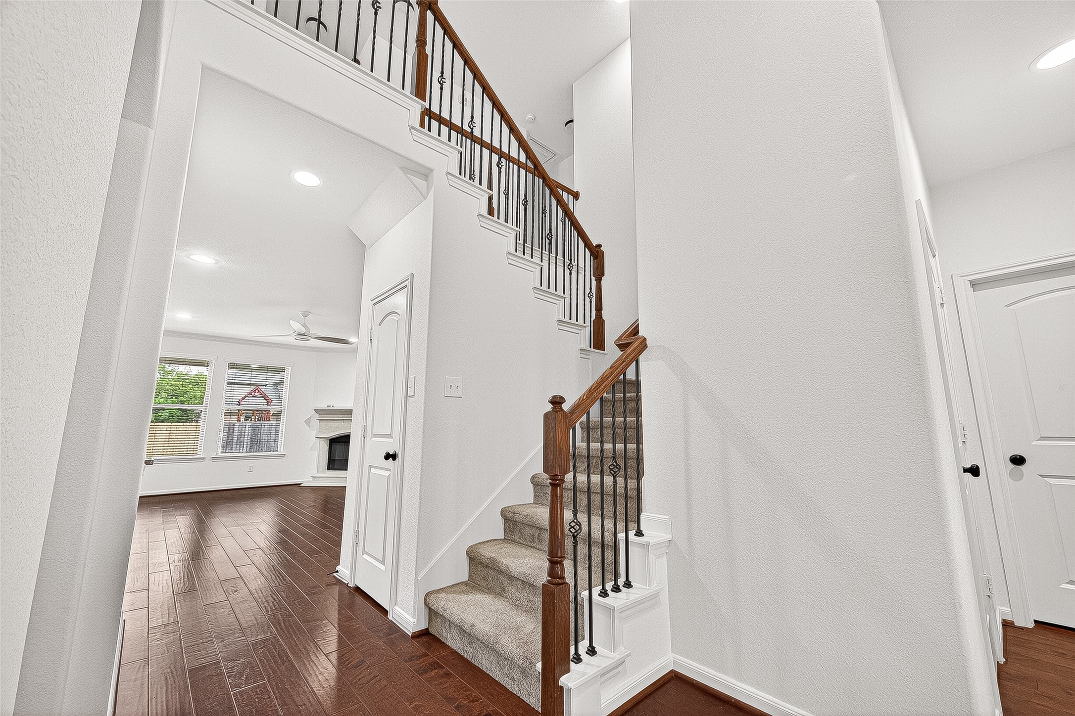 138 South Sawbridge Circle Spring, TX 77389 - Photo 5 of 37 a view of entryway with wooden floor and stairs