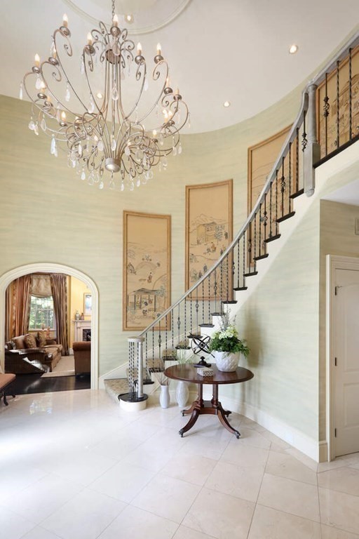 177 Bridle Trail Road Needham, MA 02492 - Photo 2 of 41 a view of a livingroom with furniture and a chandelier