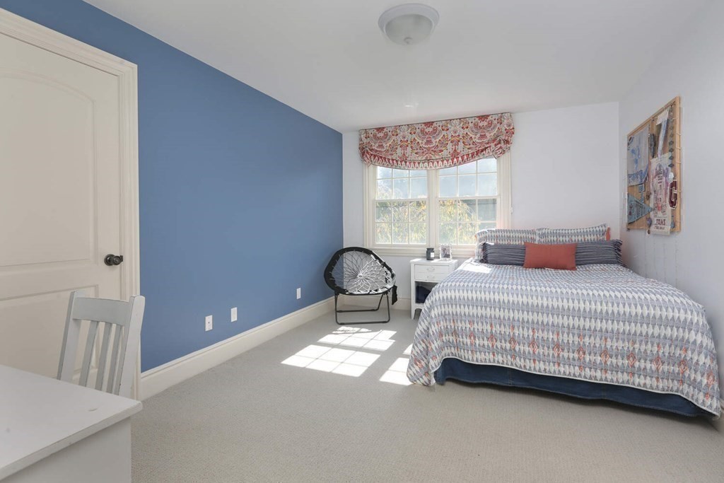 177 Bridle Trail Road Needham, MA 02492 - Photo 22 of 41 a bedroom with a bed and window
