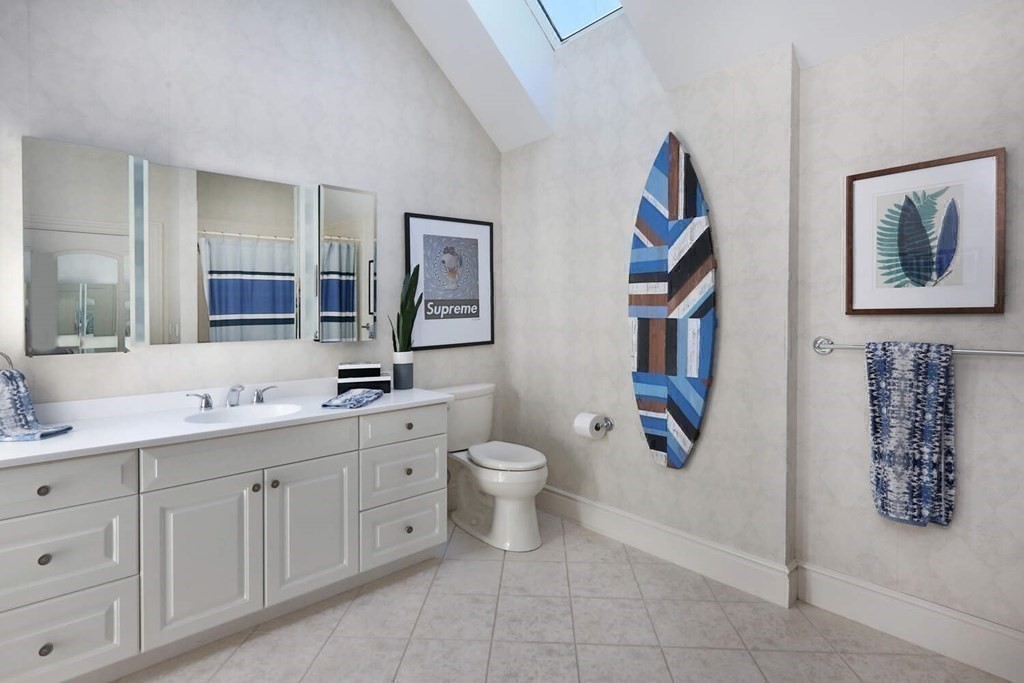 177 Bridle Trail Road Needham, MA 02492 - Photo 26 of 41 a bathroom with a toilet a sink and mirror