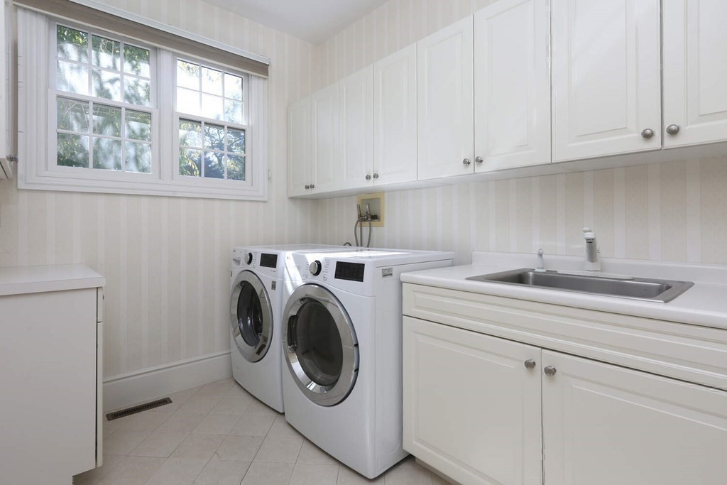 177 Bridle Trail Road Needham, MA 02492 - Photo 28 of 41 a utility room with sink dryer and washer