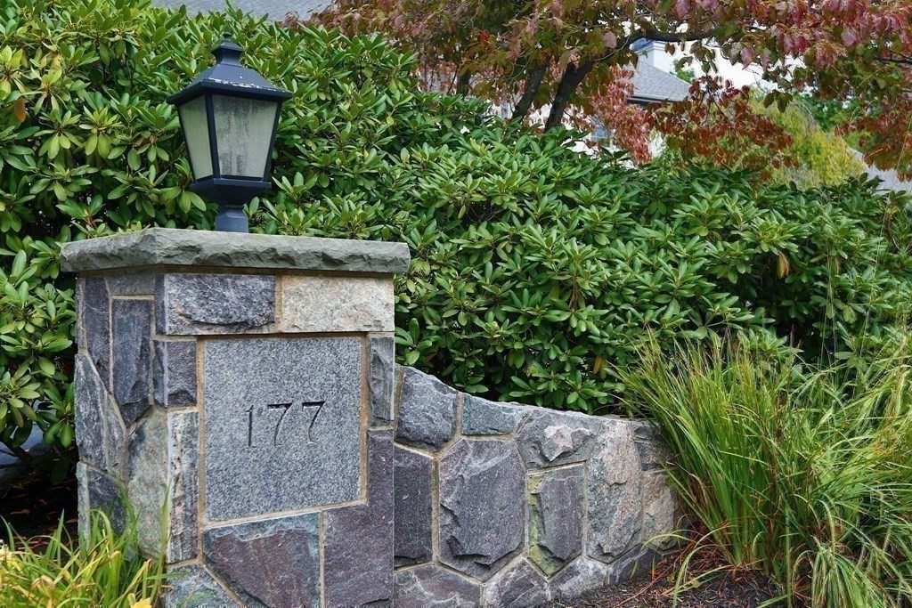 177 Bridle Trail Road Needham, MA 02492 - Photo 31 of 41 a front view of a house with a garden