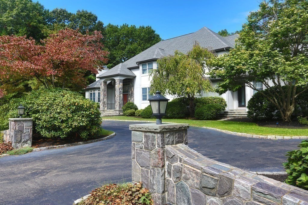 177 Bridle Trail Road Needham, MA 02492 - Photo 32 of 41 a view of a house with backyard and a garden