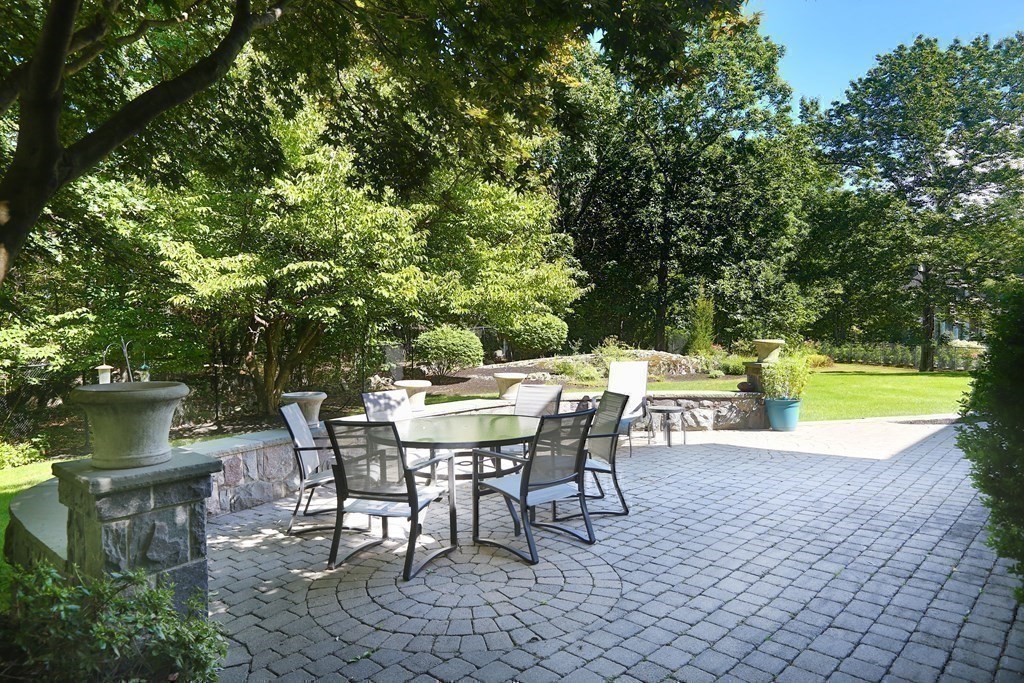 177 Bridle Trail Road Needham, MA 02492 - Photo 37 of 41 a view of a house with a swimming pool and sitting area